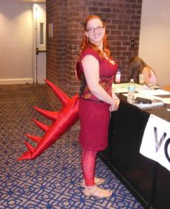 Morgan, dressed as a red dragon.