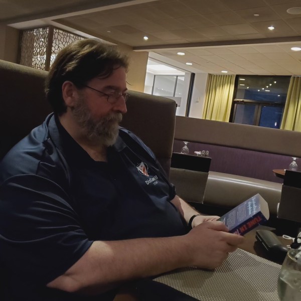 Doc reads Randee's book blurb.