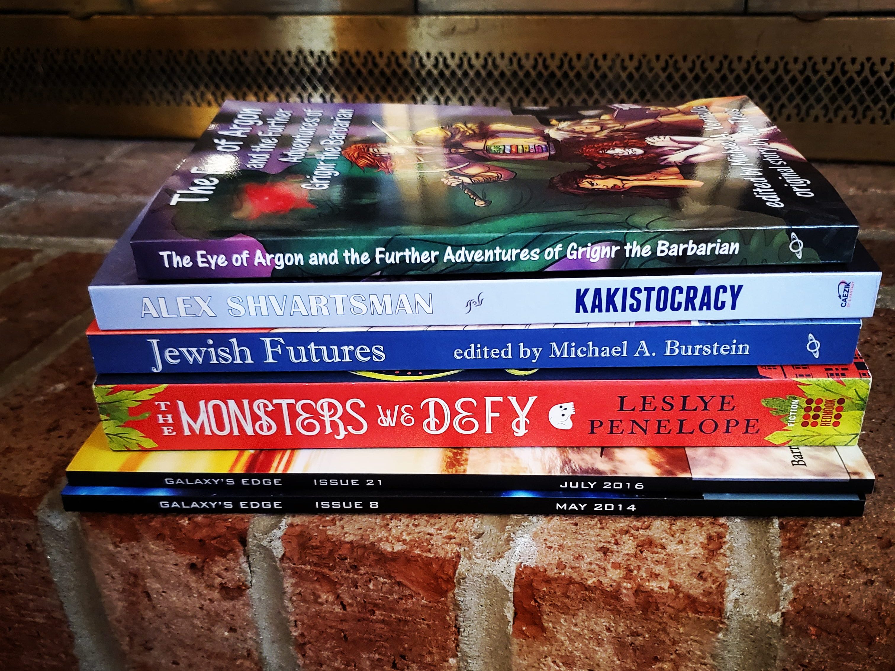 A stack of books on a brick platform.
The Eye of Argon and the Further Adventures of Grignr the Barbarian
Kakistocracy by Alex Shvartsman
Jewish Futures edited by Michael A Burstein
The Monsters We Defy by Leslye Penelope
Galaxy's Edge (magazine) Issues July 2016, May 2014